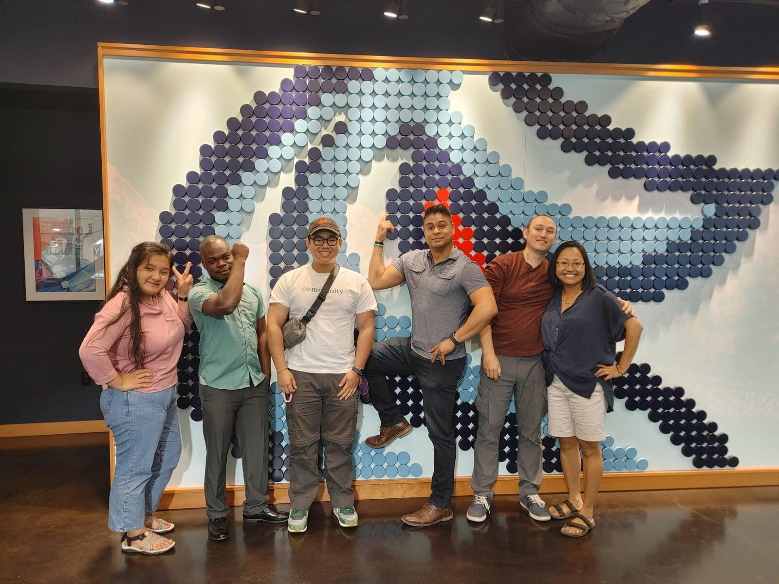 Talitha team in front of a Seattle Kraken art project.